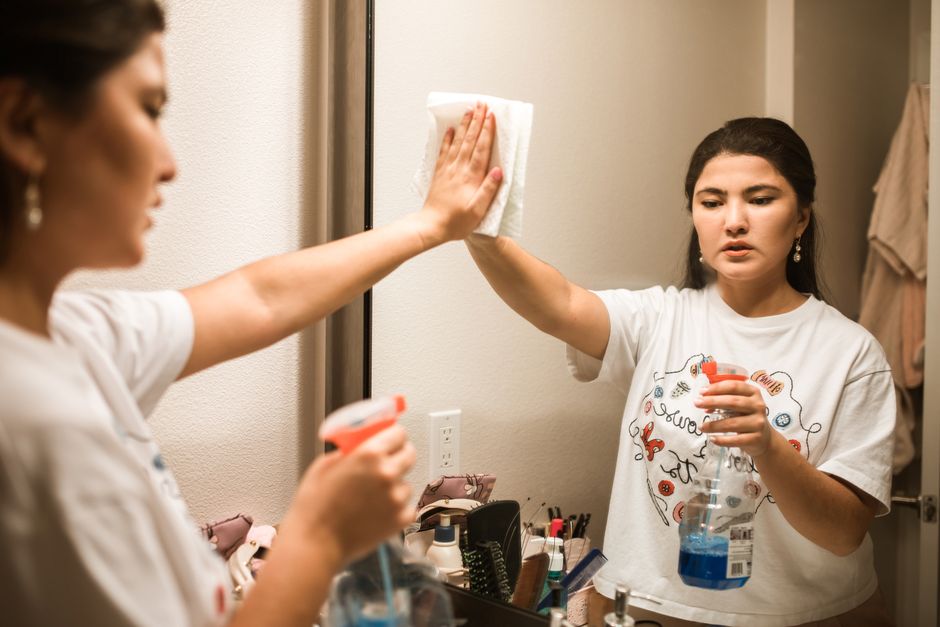 Wiping bathroom mirror